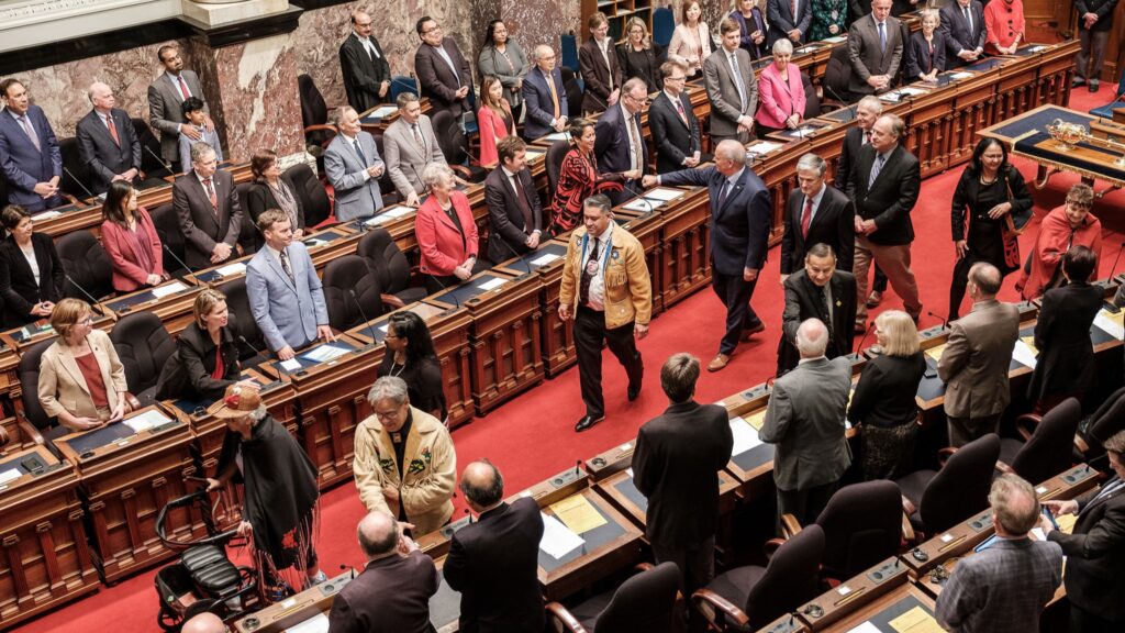 First Nations leaders and MLAs celebrate the passing of DRIPA in the House in 2019